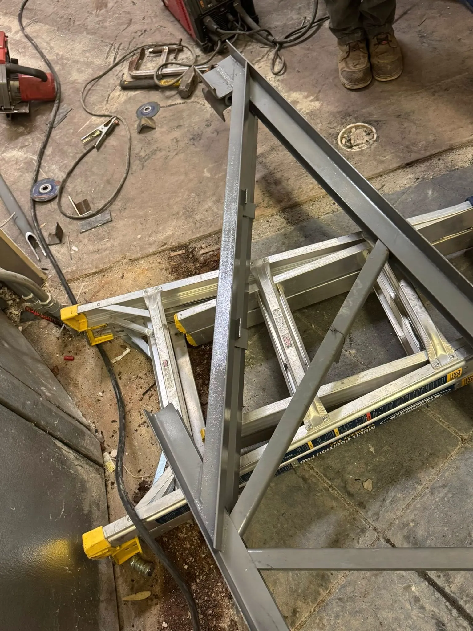 Fabricated steel frame prepared for welding estimate